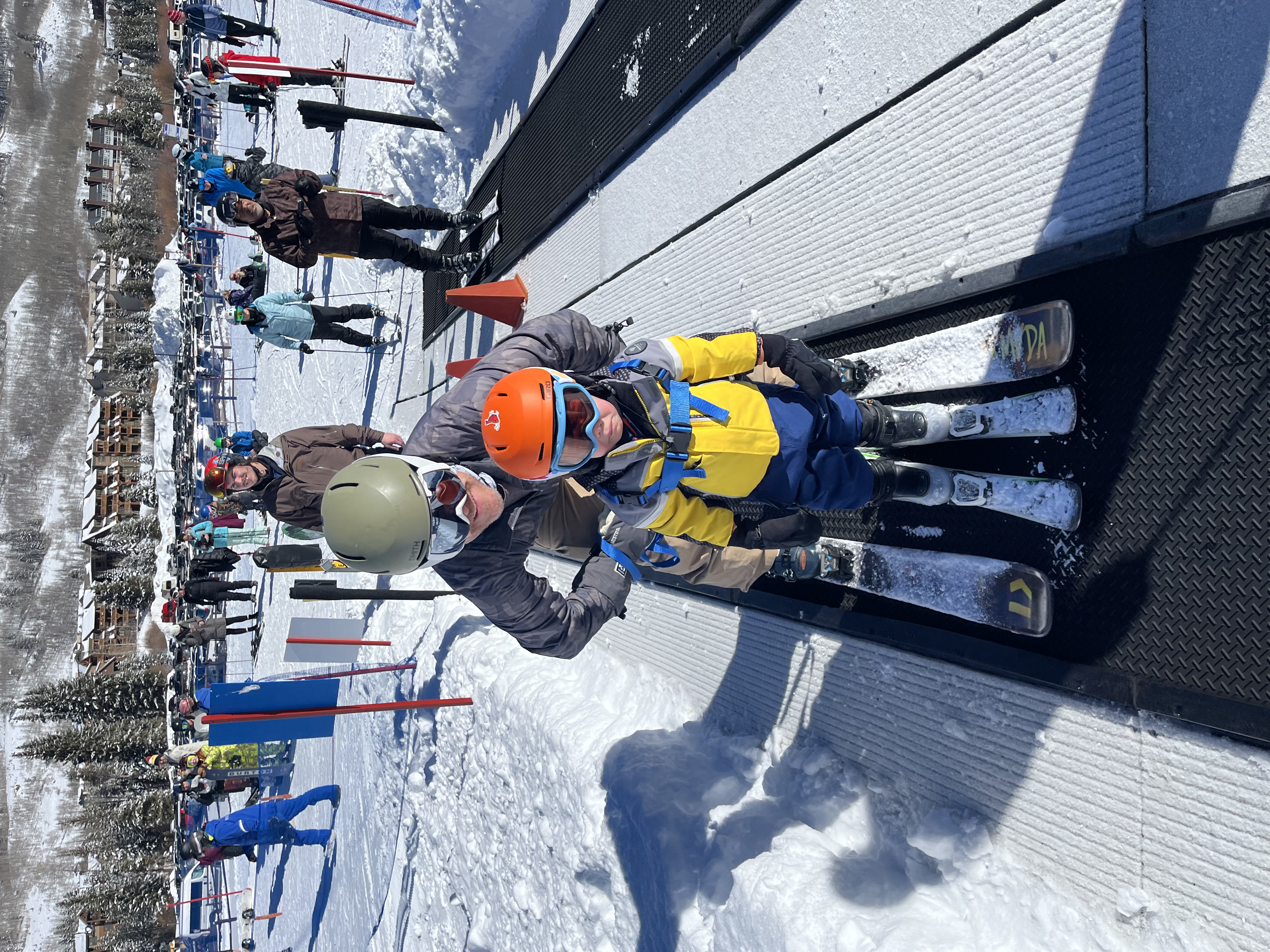 Michael Facchinello skiing with his son